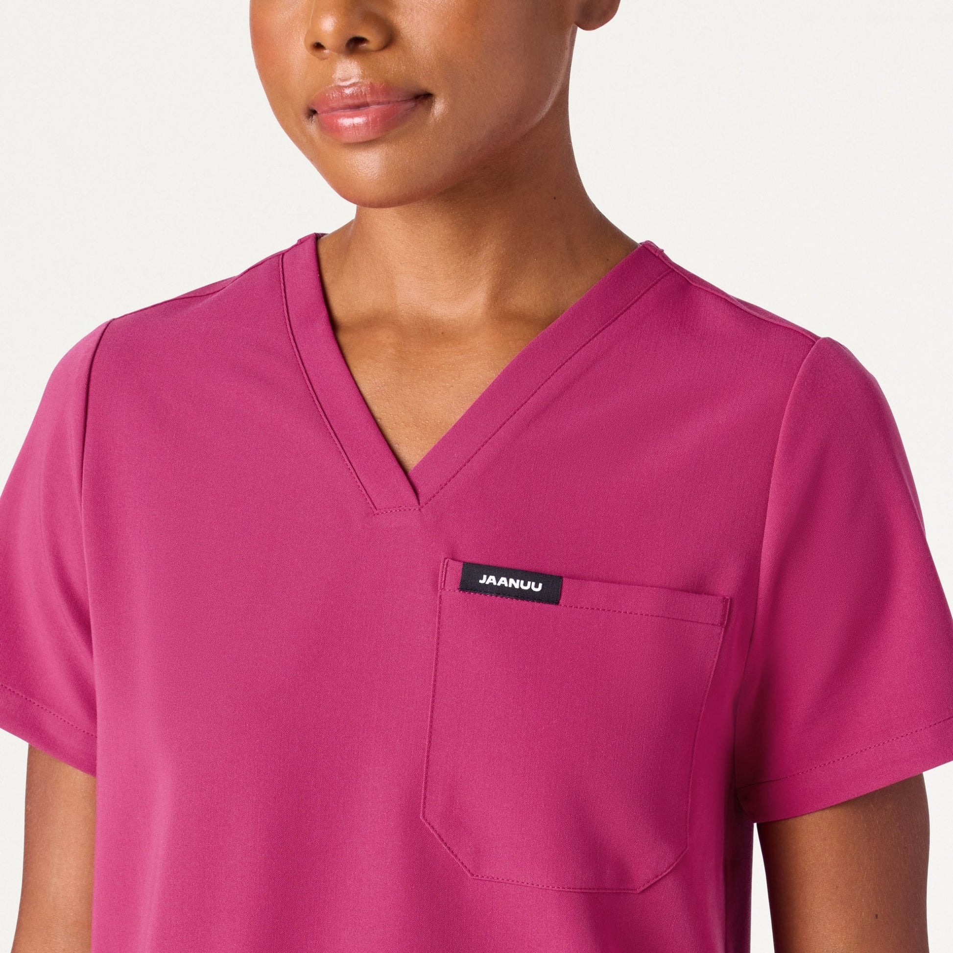 JAANUU Rhena Essential 1 pocket Scrub Top Wild Berry - Get Scrubbed