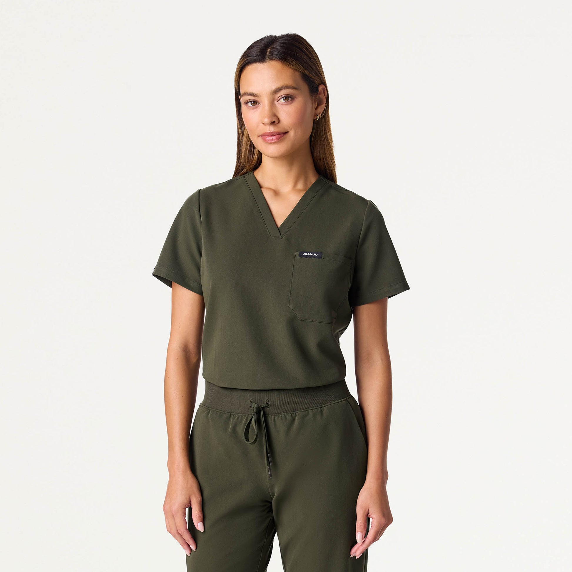 JAANUU Rhena Slim Essential 1 pocket Scrub Top Deep Olive - Get Scrubbed