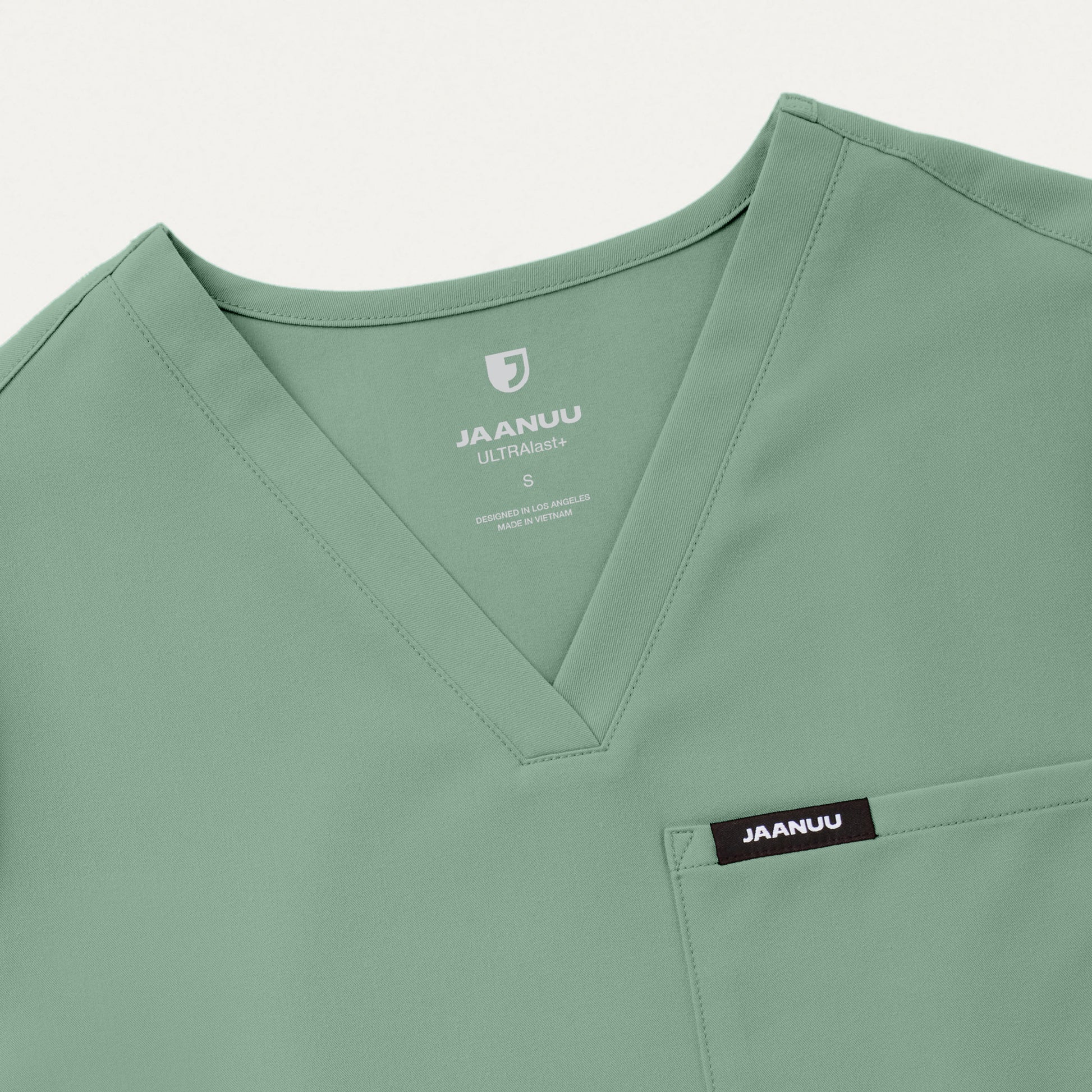 JAANUU Rhena Slim Essential 1 pocket Scrub Top Sage - Get Scrubbed