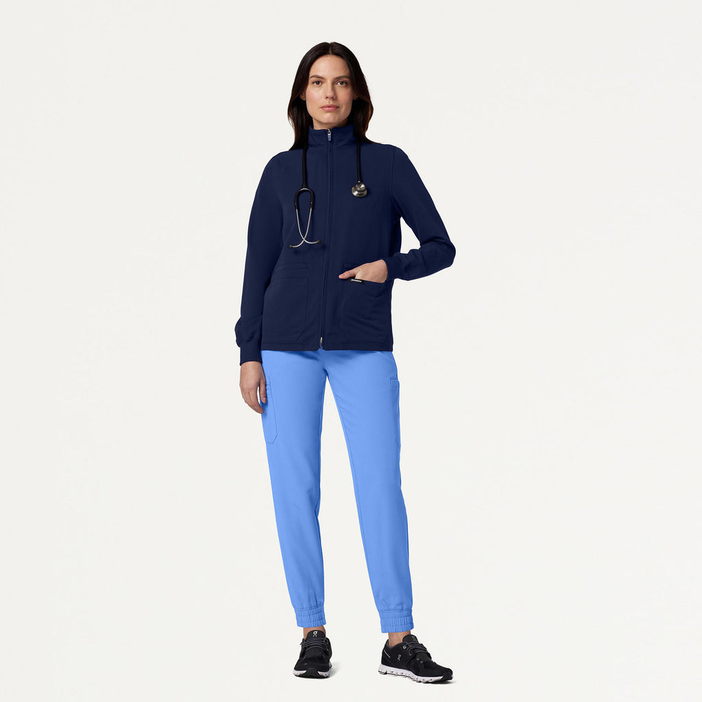 JAANUU Ceri Essential 6 - Pocket Scrub Jacket Midnight Navy - Get Scrubbed