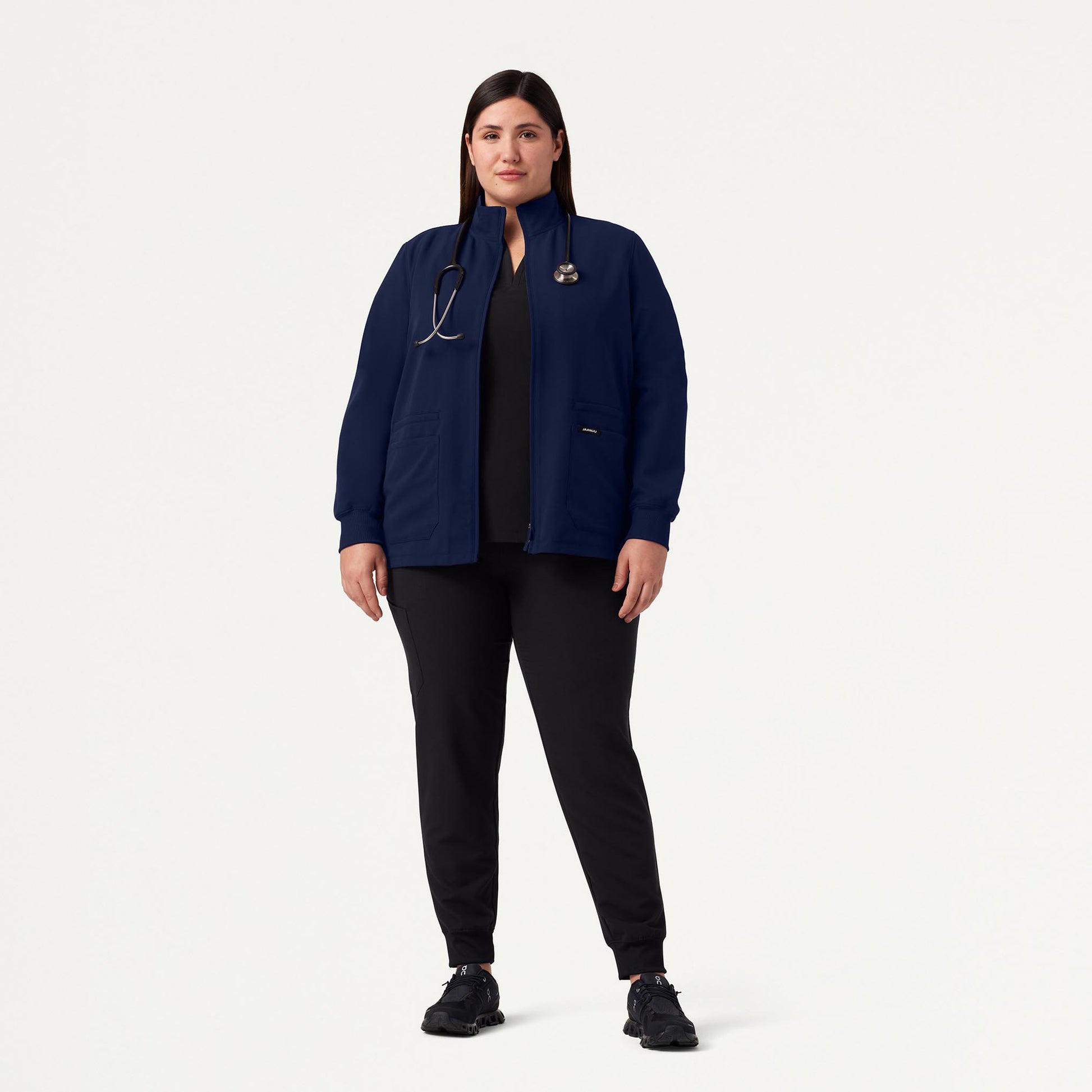 JAANUU Ceri Essential 6 - Pocket Scrub Jacket Midnight Navy - Get Scrubbed