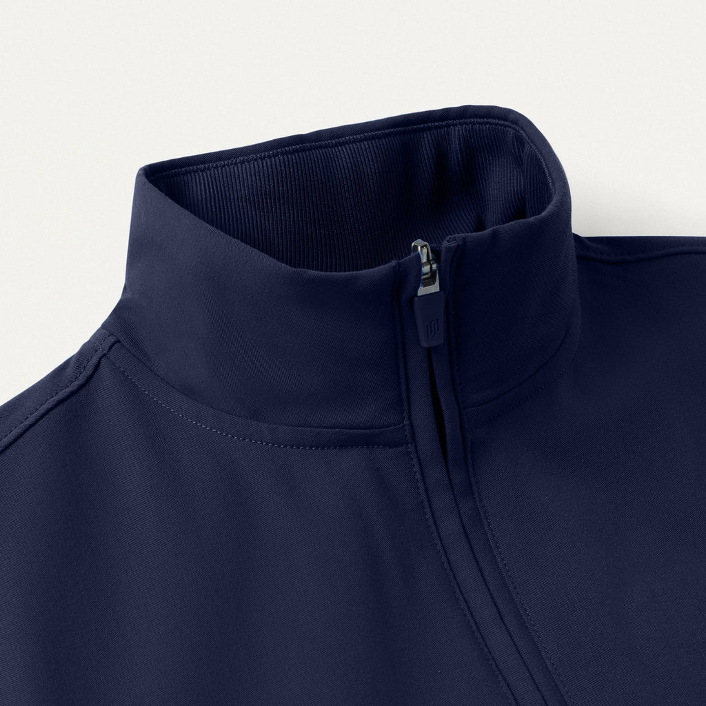 JAANUU Ceri Essential 6 - Pocket Scrub Jacket Midnight Navy - Get Scrubbed